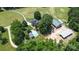 Aerial view of house, pool, and barns at 5610 Golden Pond Dr, Indian Trail, NC 28079