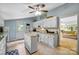 Bright kitchen with white cabinets, granite countertops, and kitchen island at 5610 Golden Pond Dr, Indian Trail, NC 28079