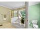 Clean bathroom with a shower/tub combo and a plant at 5610 Golden Pond Dr, Indian Trail, NC 28079