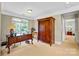 Home office with built-in wooden wardrobe and desk at 5610 Golden Pond Dr, Indian Trail, NC 28079