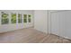 Spacious bedroom with large windows and wood floors at 144 Hickory Hollow Ln, Taylorsville, NC 28681