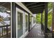 Deck with glass doors leading to lake view at 144 Hickory Hollow Ln, Taylorsville, NC 28681