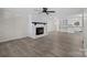 Spacious living area with fireplace and open concept to kitchen at 144 Hickory Hollow Ln, Taylorsville, NC 28681