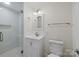 Clean bathroom with walk-in shower and white vanity at 144 Hickory Hollow Ln, Taylorsville, NC 28681