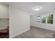 Finished basement room with lake view and vinyl flooring at 144 Hickory Hollow Ln, Taylorsville, NC 28681