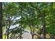 Scenic lake view with private dock and lush trees at 144 Hickory Hollow Ln, Taylorsville, NC 28681