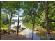 Steps down to lake access with multiple docks and boathouses at 144 Hickory Hollow Ln, Taylorsville, NC 28681
