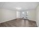 Bright basement room with lake view and French doors at 144 Hickory Hollow Ln, Taylorsville, NC 28681
