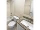 Clean bathroom with white subway tile and granite vanity at 1913 Herrin Ave, Charlotte, NC 28205
