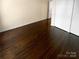 Hardwood floors and a spacious closet in this bedroom at 1913 Herrin Ave, Charlotte, NC 28205