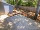 Private backyard with a patio and a storage shed at 1913 Herrin Ave, Charlotte, NC 28205
