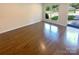 Bright living room with hardwood floors and large windows at 1913 Herrin Ave, Charlotte, NC 28205