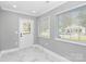 Light-filled entryway with white door and marble-look flooring at 508 Northern St, Shelby, NC 28150