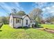 Recently remodeled white brick house featuring a large front yard and walkway leading to the front entrance at 508 Northern St, Shelby, NC 28150