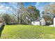 Spacious backyard with a detached garage and lush green lawn at 508 Northern St, Shelby, NC 28150