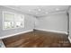 Living room with hardwood floors and large windows at 508 Northern St, Shelby, NC 28150