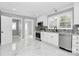 Modern kitchen with white cabinets and granite countertops at 508 Northern St, Shelby, NC 28150