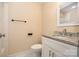 Updated bathroom with granite countertop and modern fixtures at 805 Rowan Avenue Ext, Spencer, NC 28159