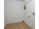 Laundry room with tile floor and hookups for washer and dryer at 805 Rowan Avenue Ext, Spencer, NC 28159
