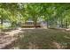 House and backyard view with lush greenery at 805 Rowan Avenue Ext, Spencer, NC 28159