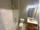 Bathroom with shower/tub combo and modern vanity at 210 Harbour Place Dr, Davidson, NC 28036
