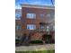 Brick townhome exterior with stairs and landscaping at 210 Harbour Place Dr, Davidson, NC 28036
