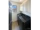 Laundry room with washer, dryer, and cabinets at 210 Harbour Place Dr, Davidson, NC 28036