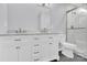 Updated bathroom with double vanity and walk in shower at 8433 Rittenhouse Cir, Charlotte, NC 28270