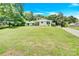 Charming single story home with a well-manicured lawn and driveway at 8433 Rittenhouse Cir, Charlotte, NC 28270