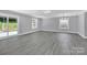 Finished basement with sliding glass doors and plenty of natural light at 8433 Rittenhouse Cir, Charlotte, NC 28270
