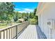 Back deck overlooking wooded area at 8433 Rittenhouse Cir, Charlotte, NC 28270
