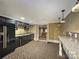 Finished basement with a kitchenette and home theatre access at 9100 Woodhall Lake Dr, Waxhaw, NC 28173