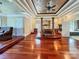 Opulent main bedroom with hardwood floors and a fireplace at 9100 Woodhall Lake Dr, Waxhaw, NC 28173