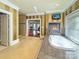 Bathroom with large soaking tub and fireplace at 9100 Woodhall Lake Dr, Waxhaw, NC 28173