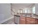 Kitchen with granite countertops, stainless steel dishwasher and sink at 3921 Sky Dr, Charlotte, NC 28226