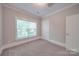 Well-lit bedroom featuring a large window at 3921 Sky Dr, Charlotte, NC 28226