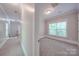 Well-lit bedroom with carpet and neutral decor at 3921 Sky Dr, Charlotte, NC 28226