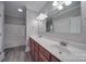 Bathroom with double vanity, tub, and updated fixtures at 3921 Sky Dr, Charlotte, NC 28226