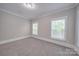 Spacious bedroom with carpet and neutral decor at 3921 Sky Dr, Charlotte, NC 28226