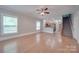 Spacious living room with hardwood floors and ceiling fan at 3921 Sky Dr, Charlotte, NC 28226