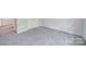 Spacious bedroom featuring grey carpet and ample space at 6232 Hickory Cove Ln, Charlotte, NC 28269