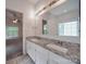 Double vanity bathroom with granite countertop at 6232 Hickory Cove Ln, Charlotte, NC 28269