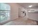 Kitchen with white cabinets and granite countertops at 6232 Hickory Cove Ln, Charlotte, NC 28269