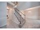 Elegant staircase leading to the upper level at 6232 Hickory Cove Ln, Charlotte, NC 28269