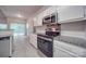 Kitchen features granite countertops and stainless steel appliances at 6232 Hickory Cove Ln, Charlotte, NC 28269