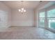 Dining room with bay window and chandelier at 6232 Hickory Cove Ln, Charlotte, NC 28269