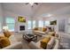 Spacious living room with a fireplace and ample natural light at 6232 Hickory Cove Ln, Charlotte, NC 28269
