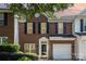 Brick front exterior of charming townhome with attached garage at 1804 Robinwood Village Dr, Gastonia, NC 28054