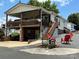 House with large deck and red chairs at 231 Badin View Rd, New London, NC 28127