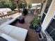 Covered deck with comfortable seating area at 231 Badin View Rd, New London, NC 28127